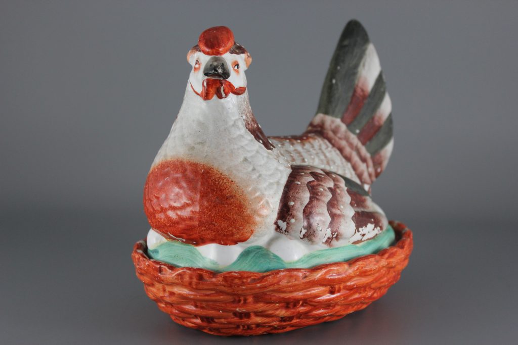 Staffordshire hen on nest
