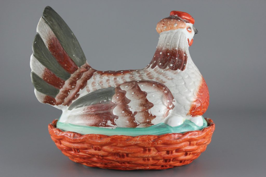 Staffordshire hen on nest