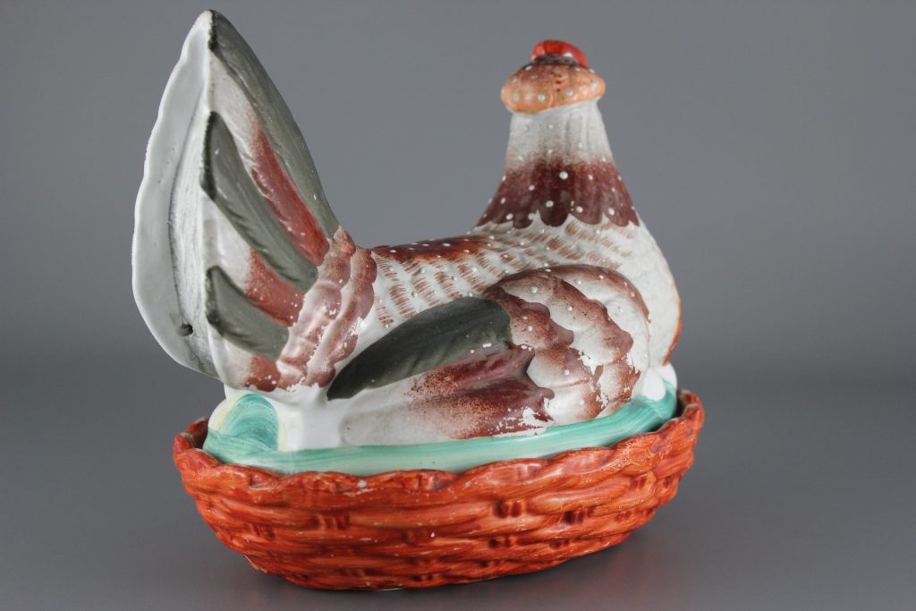 Staffordshire hen on nest